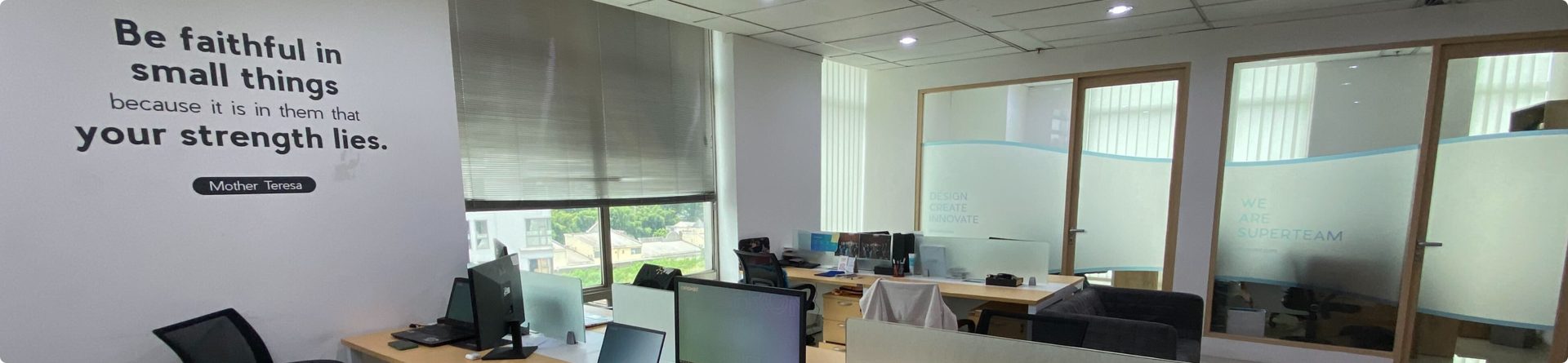 Team Boaz office building exterior in bright daylight, professional office environment